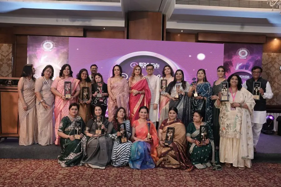 Around twenty women award winners on stage with Hema Malini at the Soulful Business Retreat 2025